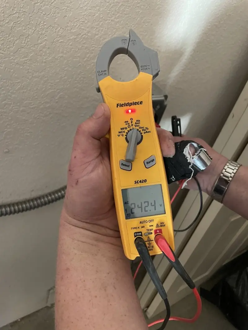Voltage testing with clamp meter during Generator Installation in Northport